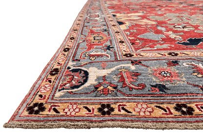Afghan Heriz rug by Kirishian Rugs, 9'07" x 13'09", light red and light blue geometric pattern, detailed traditional design.