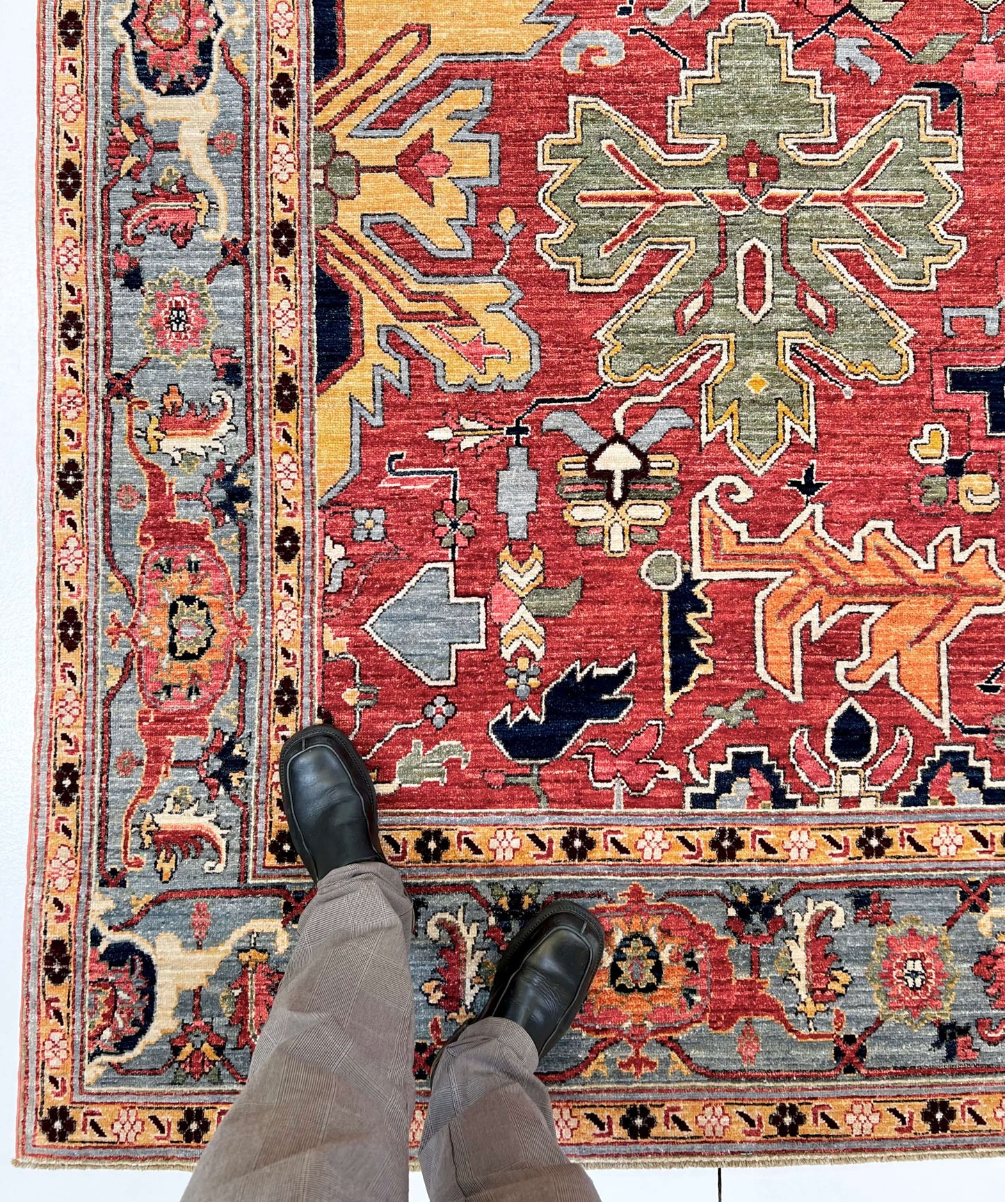 Afghan Heriz rug by Kirishian Rugs, 9'07" x 13'09", light red and light blue geometric pattern with intricate traditional design.