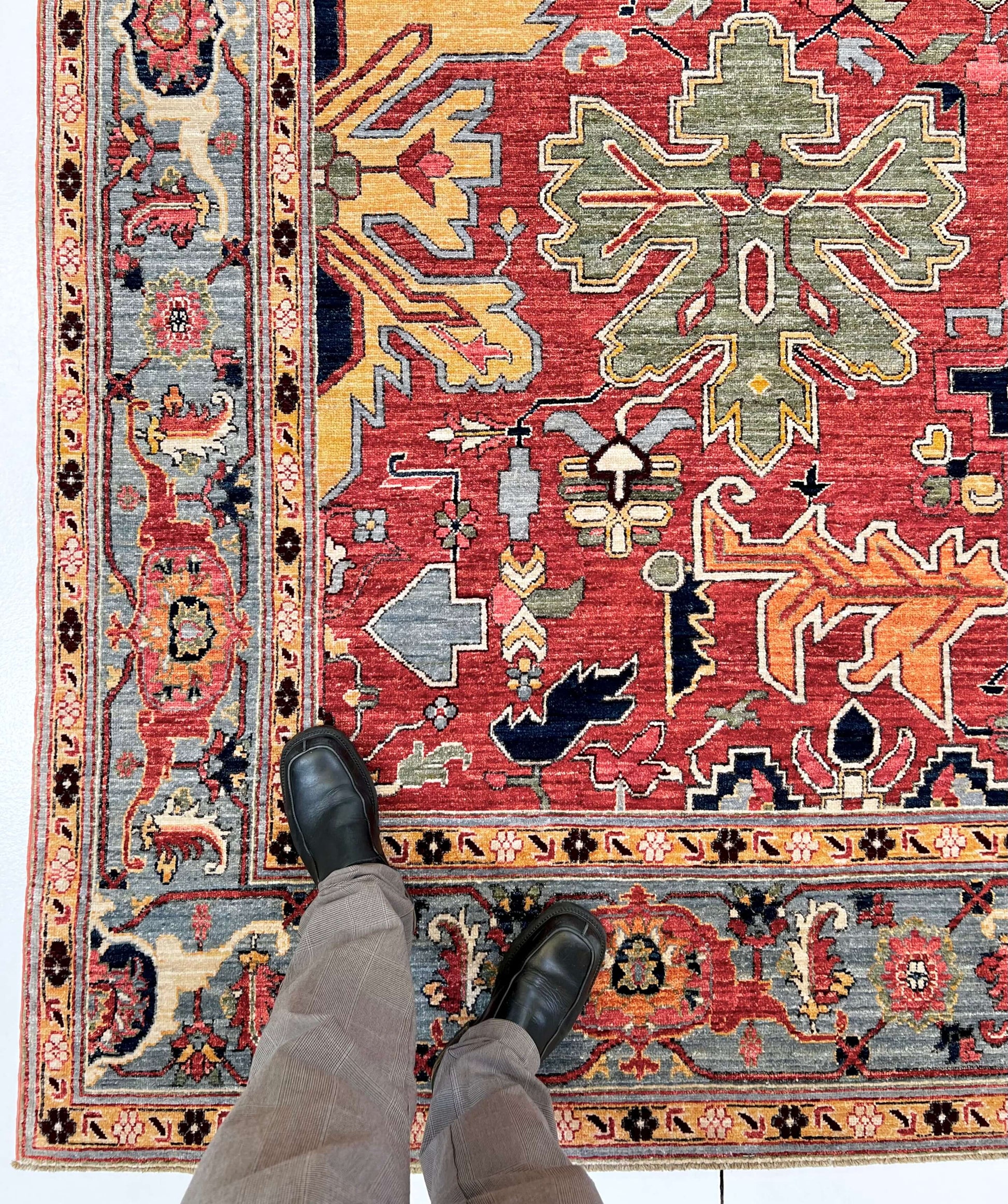 Afghan Heriz rug by Kirishian Rugs, 9'07" x 13'09", light red and light blue geometric pattern with intricate traditional design.