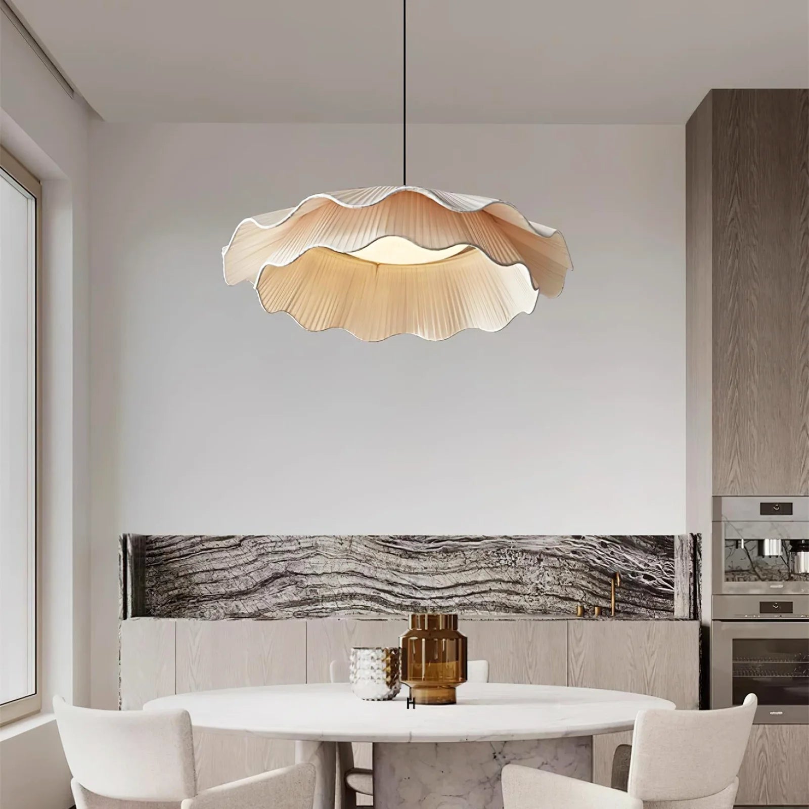 Isabella flower pendant light by korewolamp with a delicate, floral-inspired design hanging from a ceiling fixture.