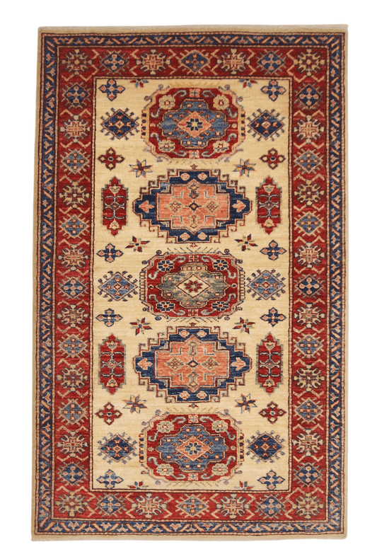 Kirishian Rugs Super Kazak rug, ivory and red, 3'01" x 5'00", with intricate geometric patterns and traditional design.