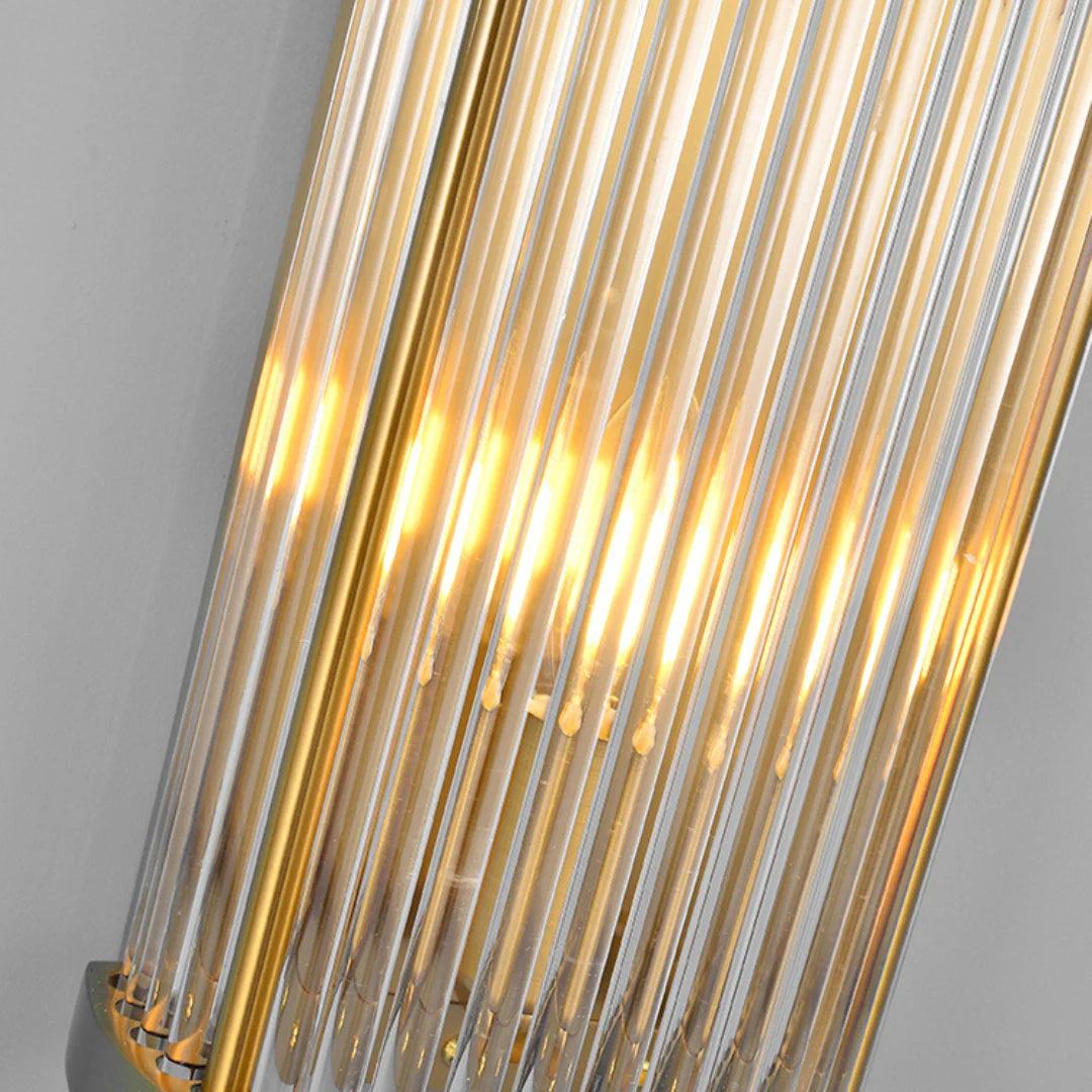 Korewolamp Jadssox crystal column wall light with sleek modern design and clear glass crystal accents on a wall.