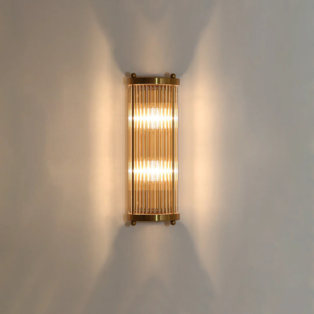 Korewolamp Jadssox crystal column wall light with sleek modern design and clear glass detailing, mounted on a wall.