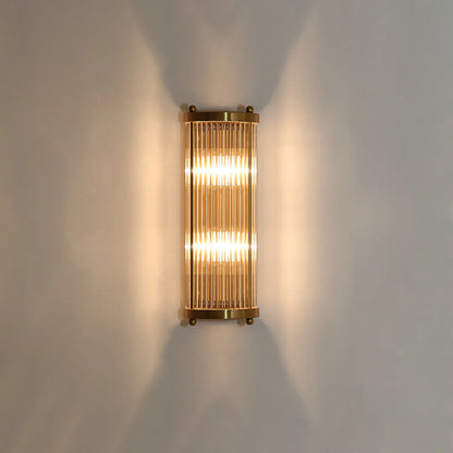 Korewolamp Jadssox crystal column wall light with sleek modern design and clear glass detailing, mounted on a wall.
