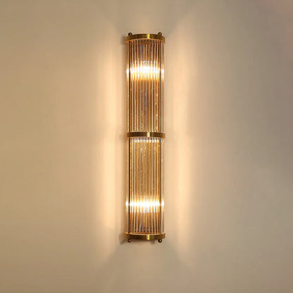 Korewolamp Jadssox crystal column wall light mounted on a wall, featuring a sleek modern design with crystal accents and metal finish.