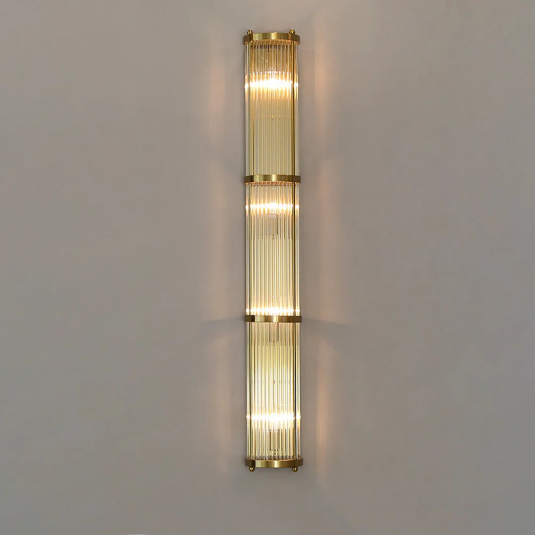 Korewolamp Jadssox crystal column wall light with sleek modern design and clear glass shade mounted on a wall fixture.