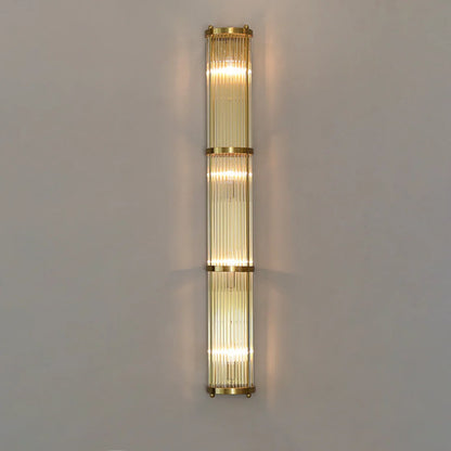 Korewolamp Jadssox crystal column wall light with sleek modern design and clear glass shade mounted on a wall fixture.