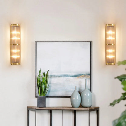 Korewolamp Jadssox crystal column wall lamp with sleek design and illuminated crystal accents, mounted on a wall.