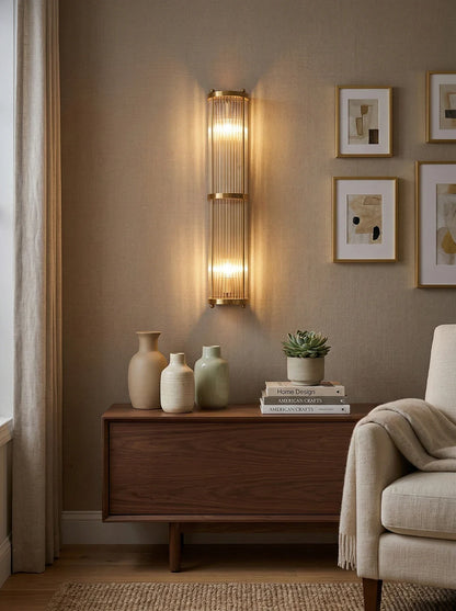 Korewolamp Jadssox crystal column wall lamp with sleek design and glass crystal accents, mounted on a wall.