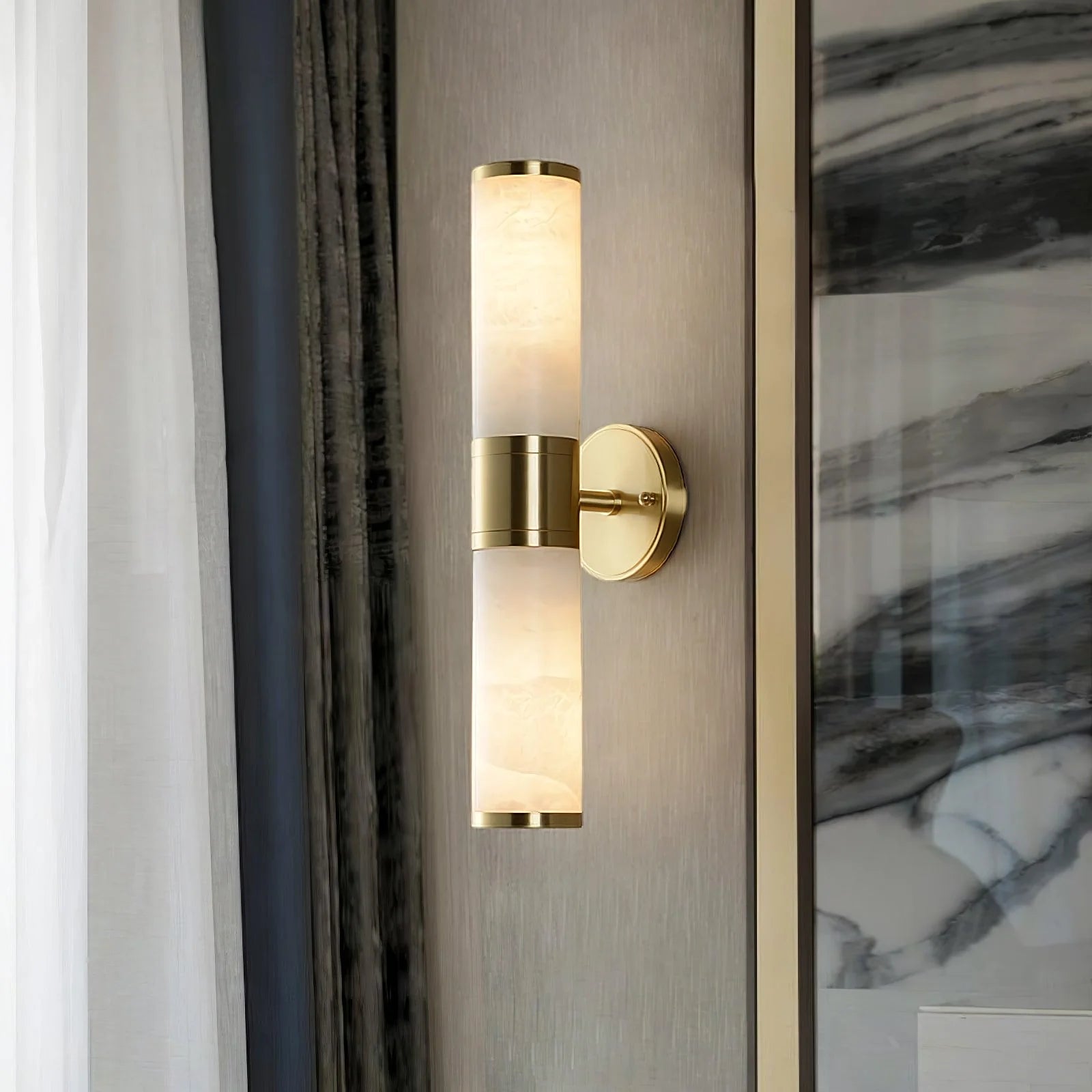 Alabaster Lampatron cylindrical wall lamp by korewolamp, featuring a sleek marble finish and modern cylindrical design.