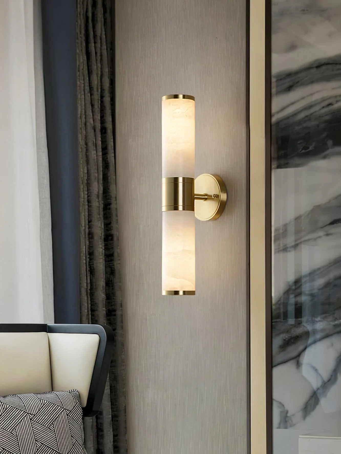 Alabaster Lampatron cylindrical wall lamp by korewolamp featuring a sleek marble design and modern wall-mounted style.