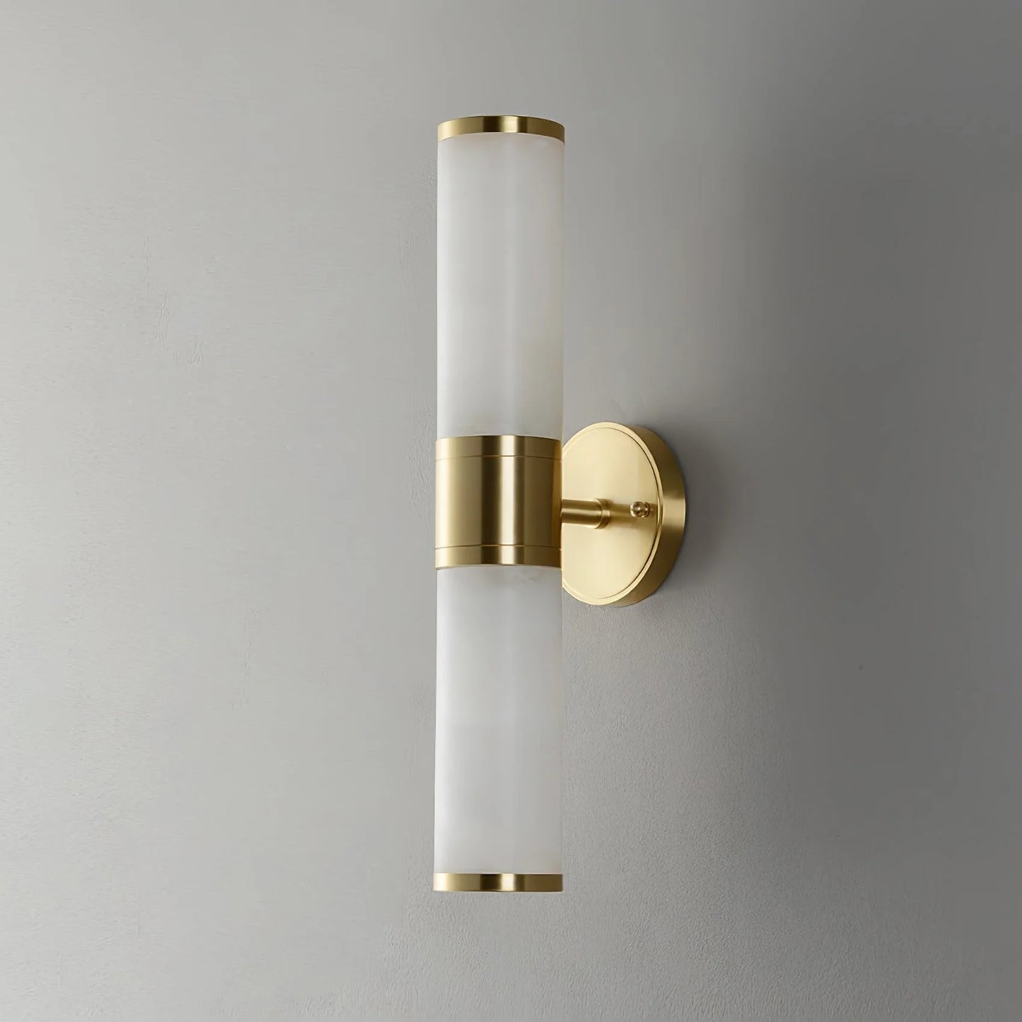 Alabaster Lampatron cylindrical wall lamp from korewolamp, featuring a sleek marble finish and modern wall lighting design.
