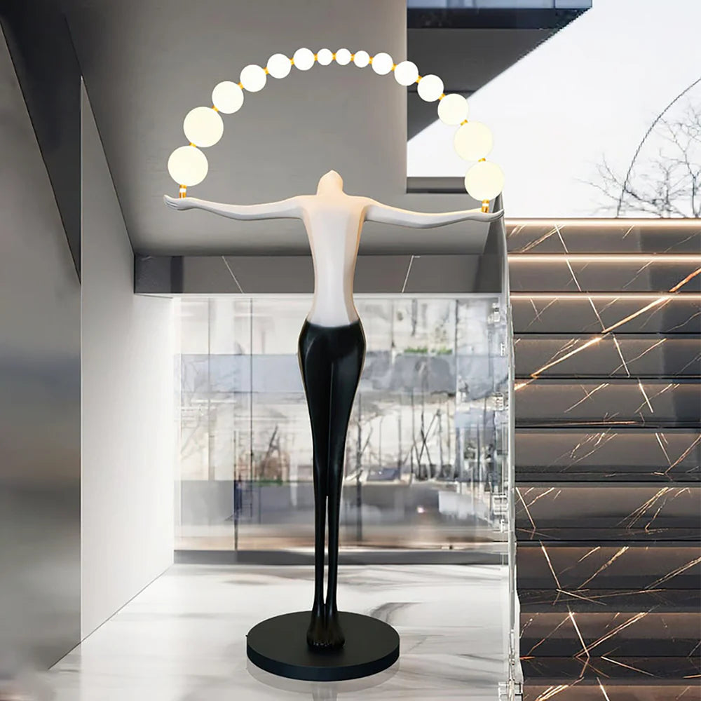 Korewolamp Liberty sculpture floor lamp with a detailed sculpture figure and a tall, modern design for stylish lighting.