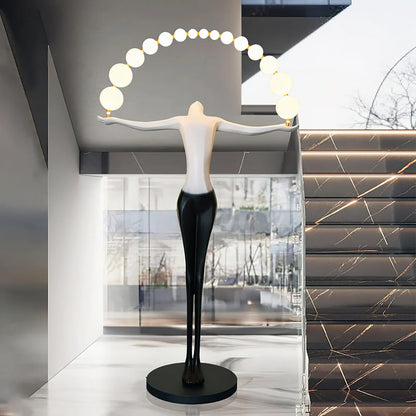 Korewolamp Liberty sculpture floor lamp with a detailed sculpture figure and a tall, modern design for stylish lighting.