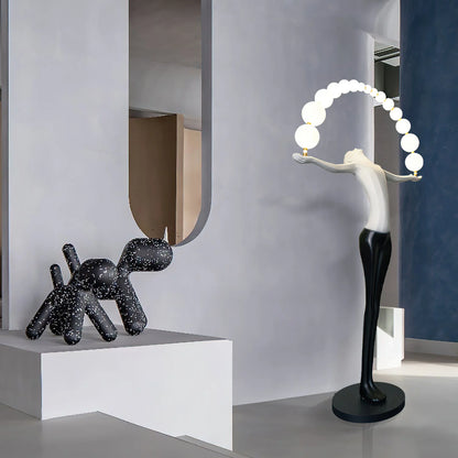 Korewolamp Liberty sculpture floor lamp with artistic design, featuring a tall standing lamp with a decorative sculpture base.