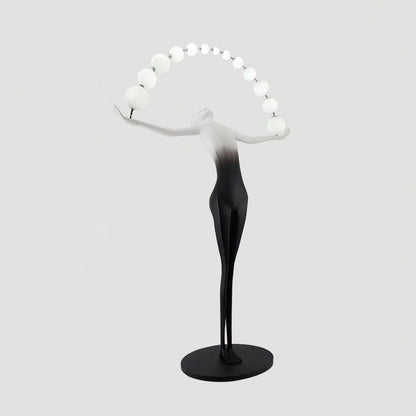 Korewolamp Liberty sculpture floor lamp with artistic metal figure design and adjustable height, modern lighting for living spaces.