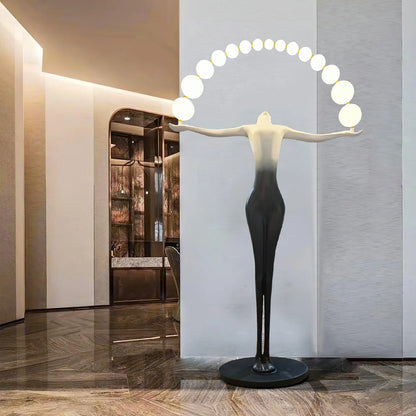 Korewolamp Liberty sculpture floor lamp with intricate design, standing tall with a decorative base and elegant lighting fixture.