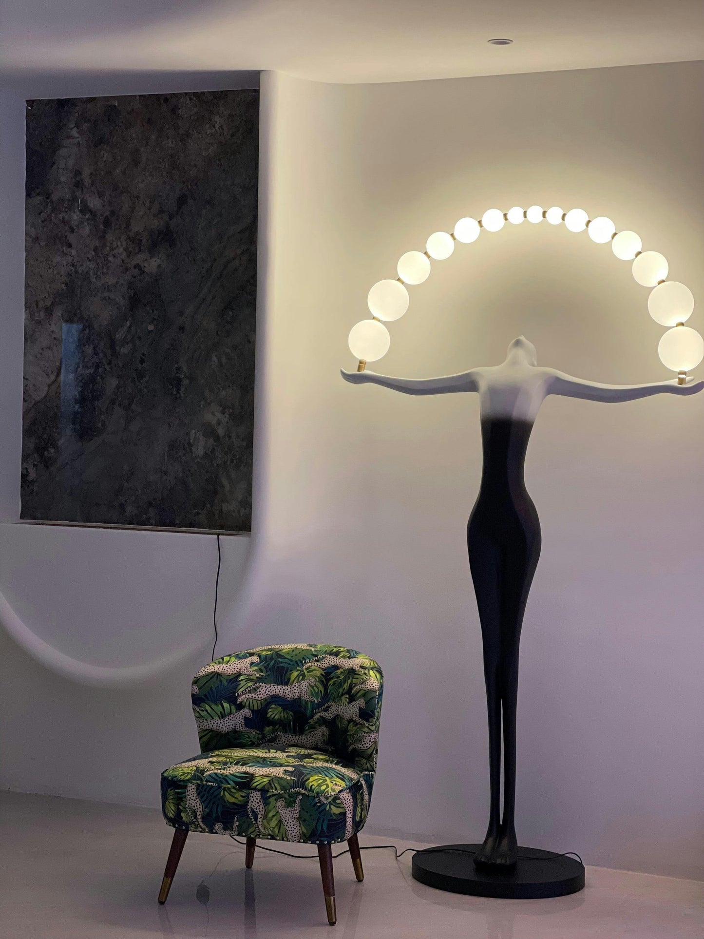 Korewolamp Liberty sculpture figure floor lamp with a detailed sculpture base and a tall, elegant lampshade for modern living spaces.