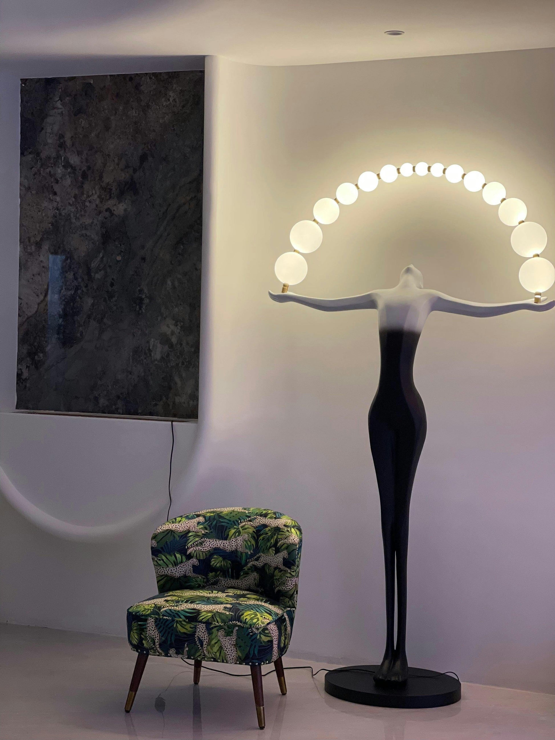 Korewolamp Liberty sculpture figure floor lamp with a detailed sculpture base and a tall, elegant lampshade for modern living spaces.