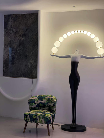 Korewolamp Liberty sculpture figure floor lamp with a detailed sculpture base and a tall, elegant lampshade for modern living spaces.