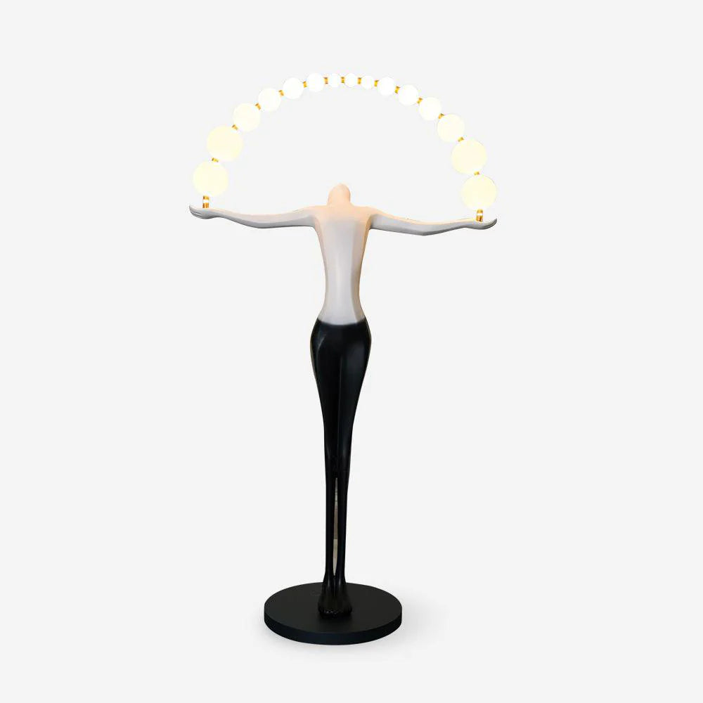 Liberty sculpture-themed floor lamp by korewolamp with a detailed, artistic base and tall, adjustable lighting fixture.