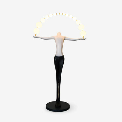 Liberty sculpture-themed floor lamp by korewolamp with a detailed, artistic base and tall, adjustable lighting fixture.
