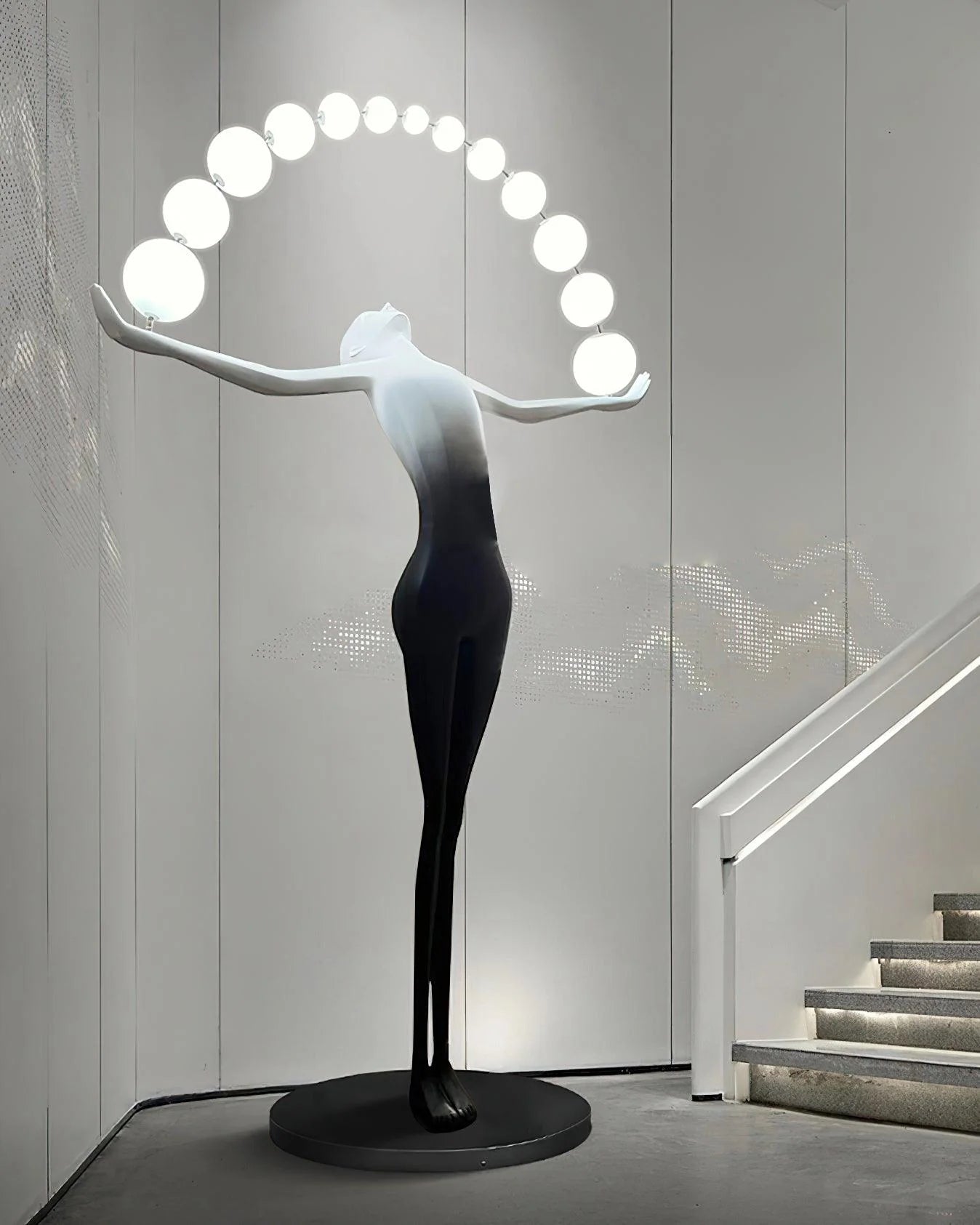 Liberty sculpture figure floor lamp by korewolamp with a detailed sculpture base and a tall, elegant lampshade.