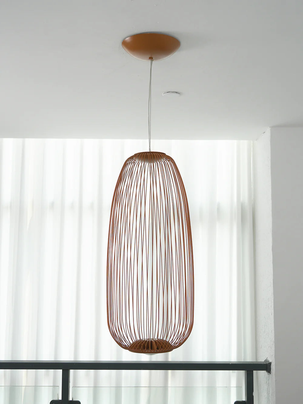 Lightweight spokes-shaped cage pendant lamp by korewolamp, modern pendant light with airy, open design for contemporary decor.
