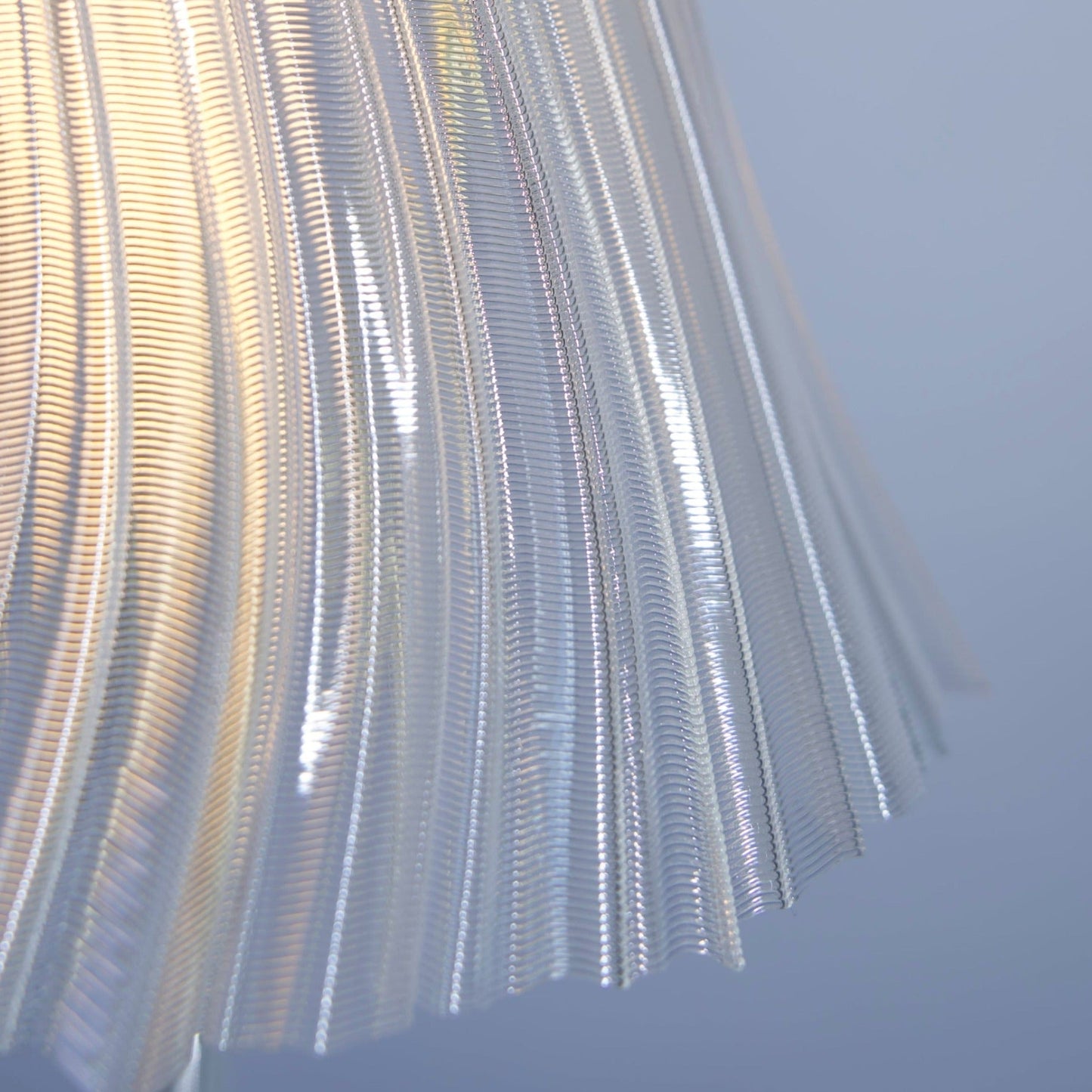 Slim tall Pleat Lamp by Wooj Design featuring a pleated fabric shade and sleek modern design.