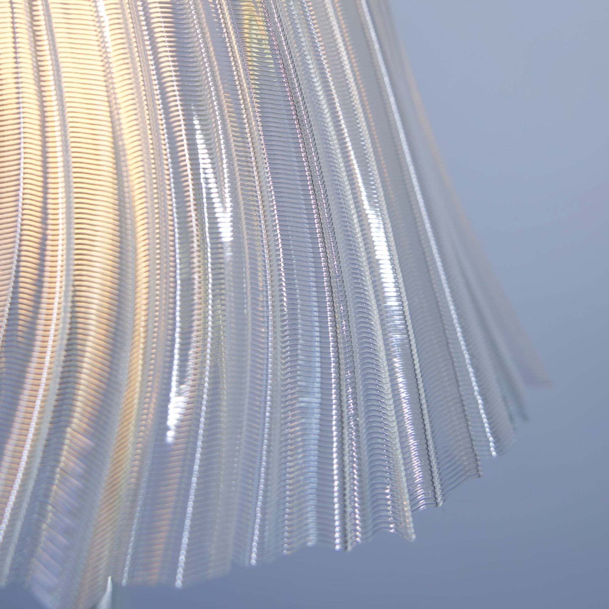 Slim tall Pleat Lamp by Wooj Design featuring a pleated fabric shade and sleek modern design.