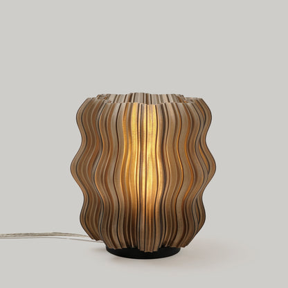 Mini Wavy Lamp by Wooj Design featuring a sleek, wavy silhouette in a smoke color finish.