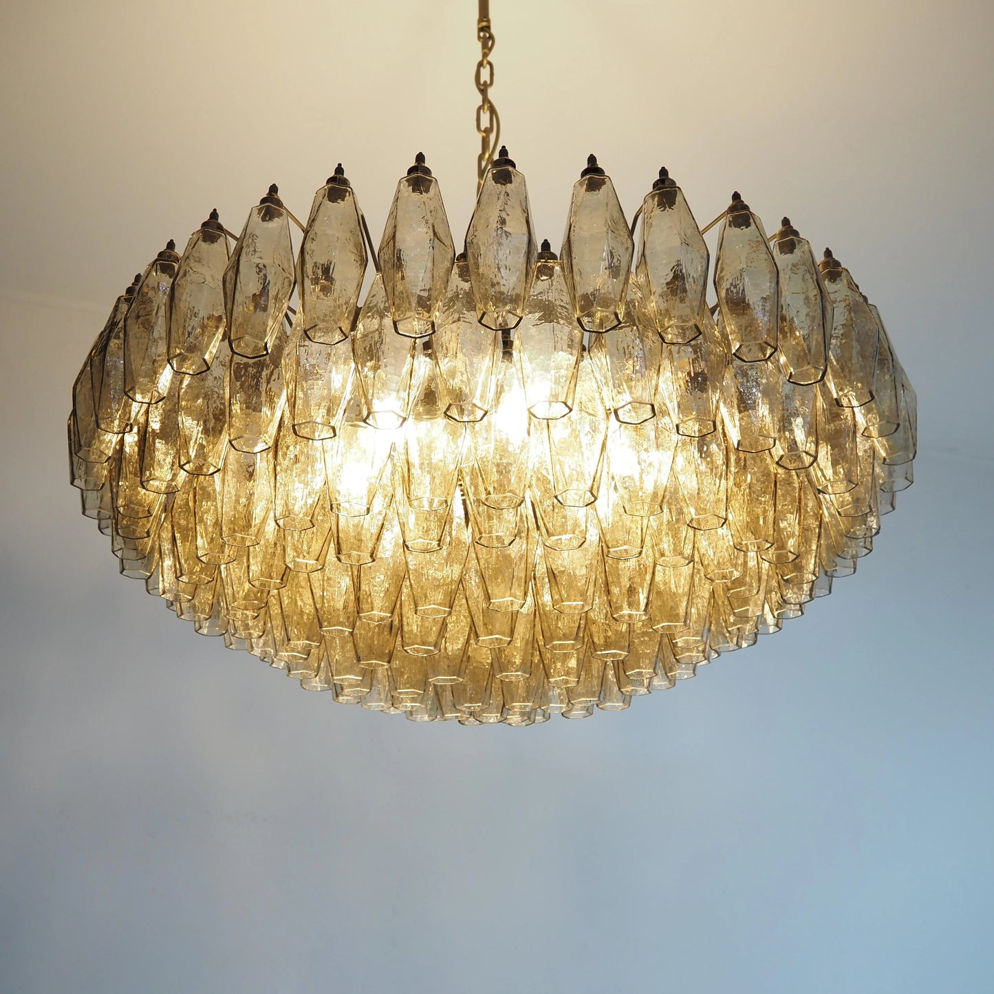 Murano faceted smoked glass chandelier by korewolamp featuring multiple glass prisms and a sleek, modern design.