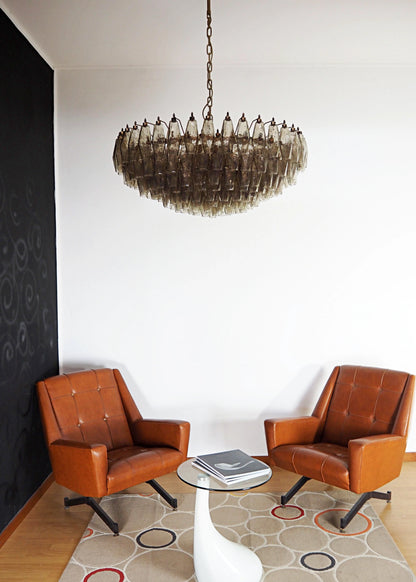 Murano faceted smoked glass chandelier by korewolamp with multiple glass facets and a sleek, modern design.