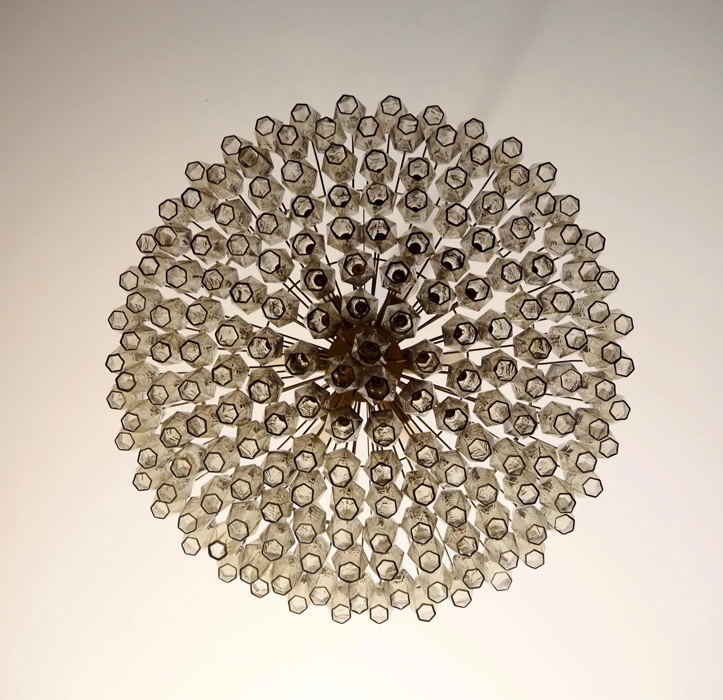 Murano faceted smoked glass chandelier by korewolamp featuring multiple glass facets and a sophisticated design.