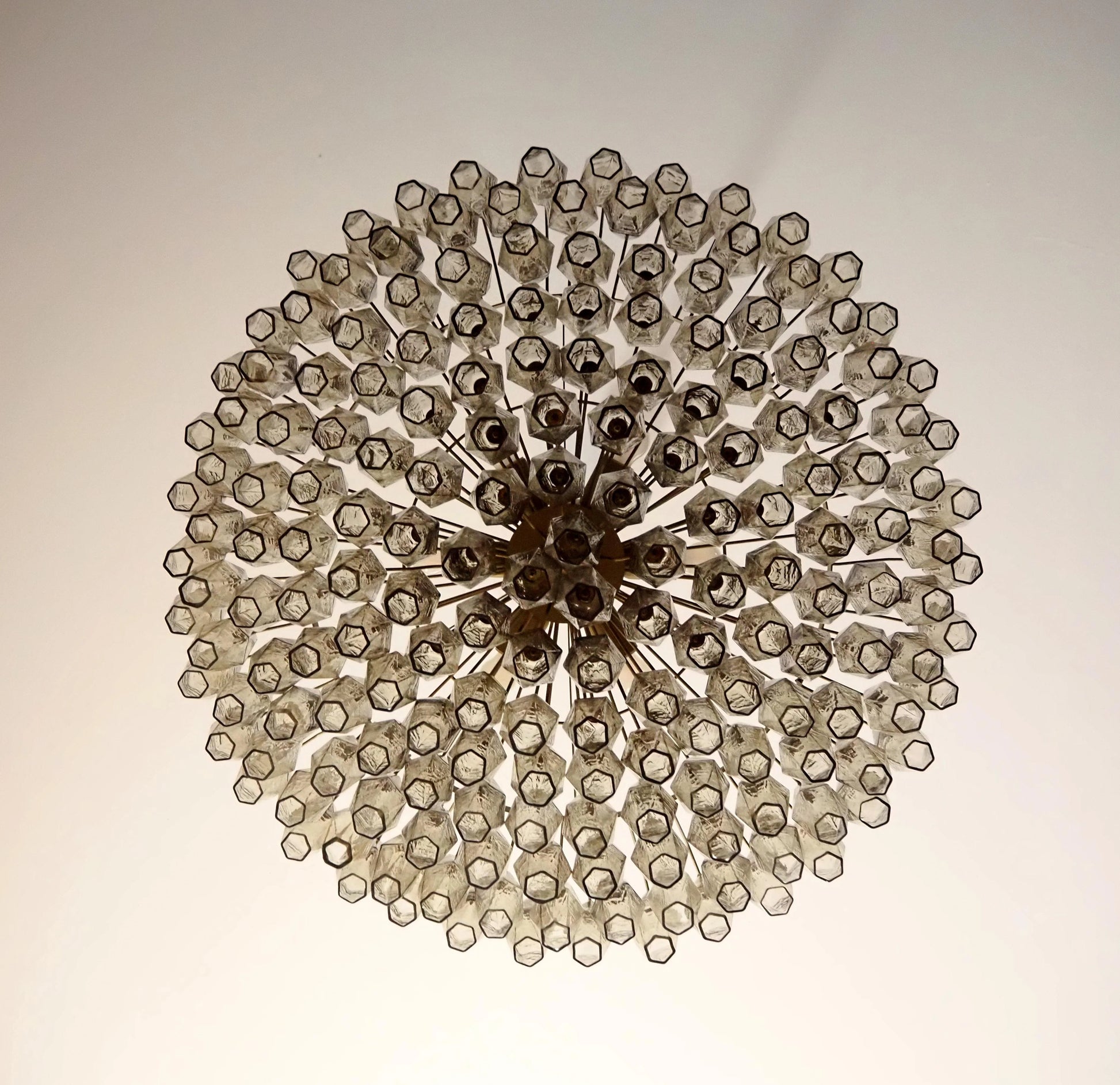Murano faceted smoked glass chandelier by korewolamp featuring multiple glass facets and a sophisticated design.