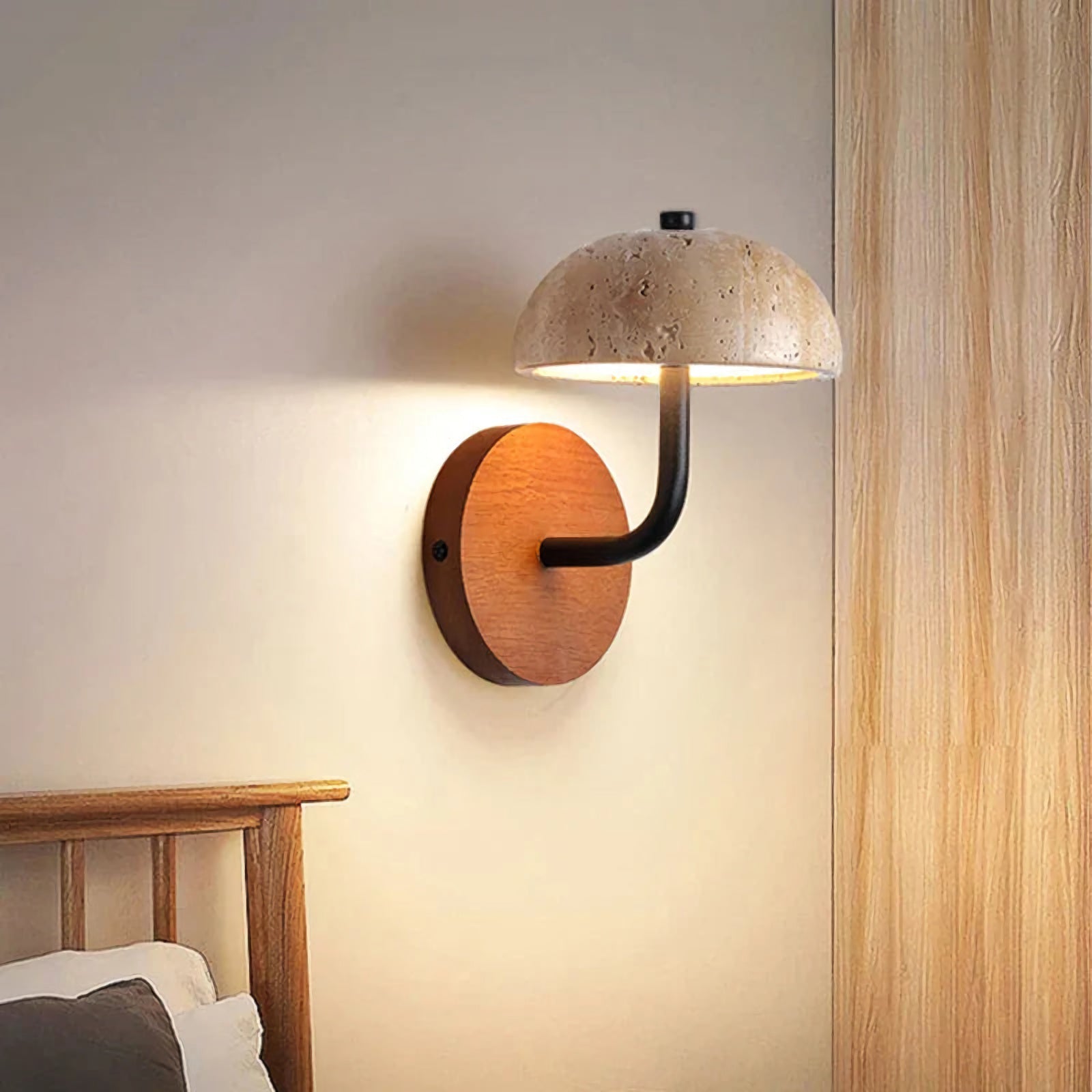 Mushroom-shaped natural stone LED wall lamp by korewolamp mounted on a wall, showcasing its textured stone surface and warm lighting.