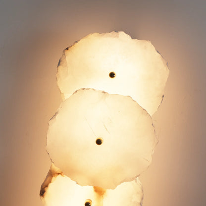 Korewolamp Petra wall lamp with a sleek, modern design mounted on a plain wall