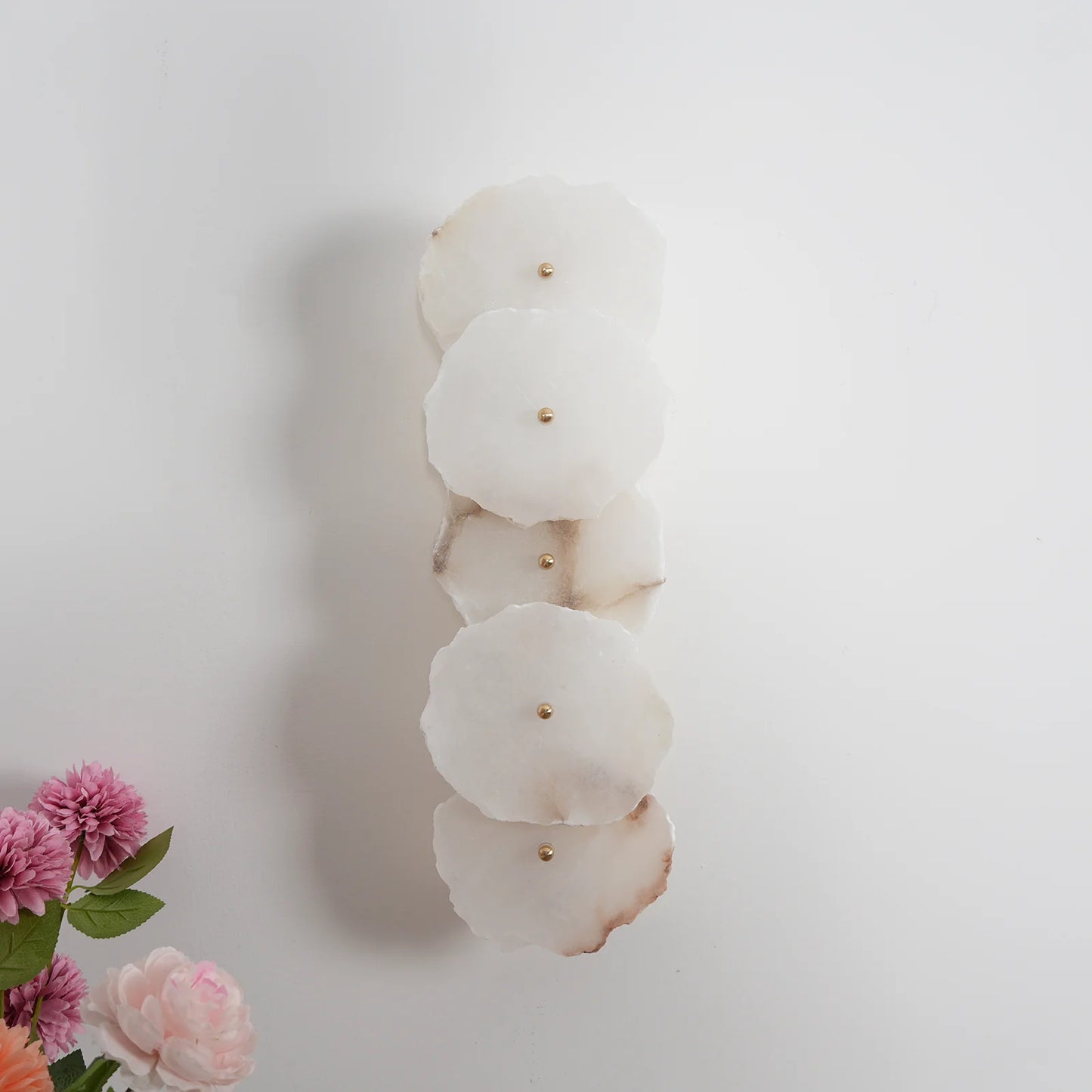Korewolamp Petra wall lamp with sleek design, mounted on a wall, featuring a modern, minimalist style and warm lighting.