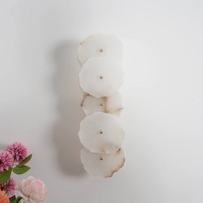 Korewolamp Petra wall lamp with sleek design, mounted on a wall, featuring a modern, minimalist style and warm lighting.
