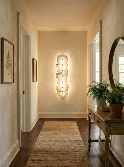 Korewolamp Petra wall lamp with a sleek modern design, featuring a curved metal arm and a minimalist lampshade for stylish lighting.