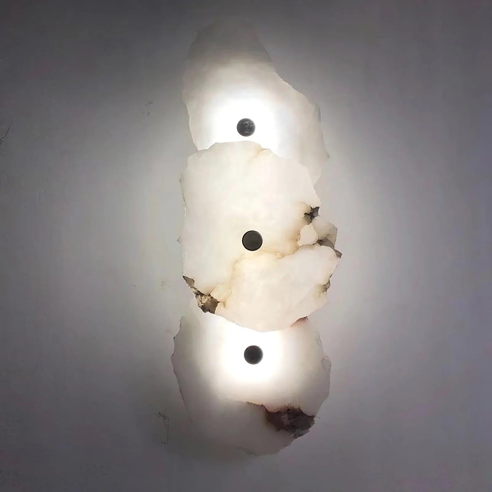Korewolamp Petra wall lamp with sleek modern design, mounted on a wall, providing ambient lighting in a stylish interior space.