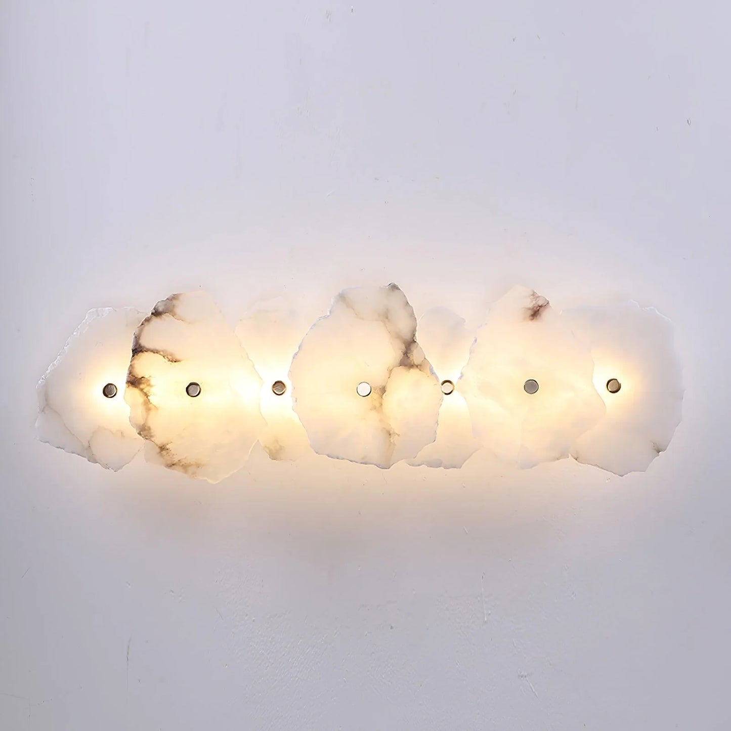 Korewolamp Petra wall lamp featuring a sleek, modern design with a warm-colored shade mounted on a wall.