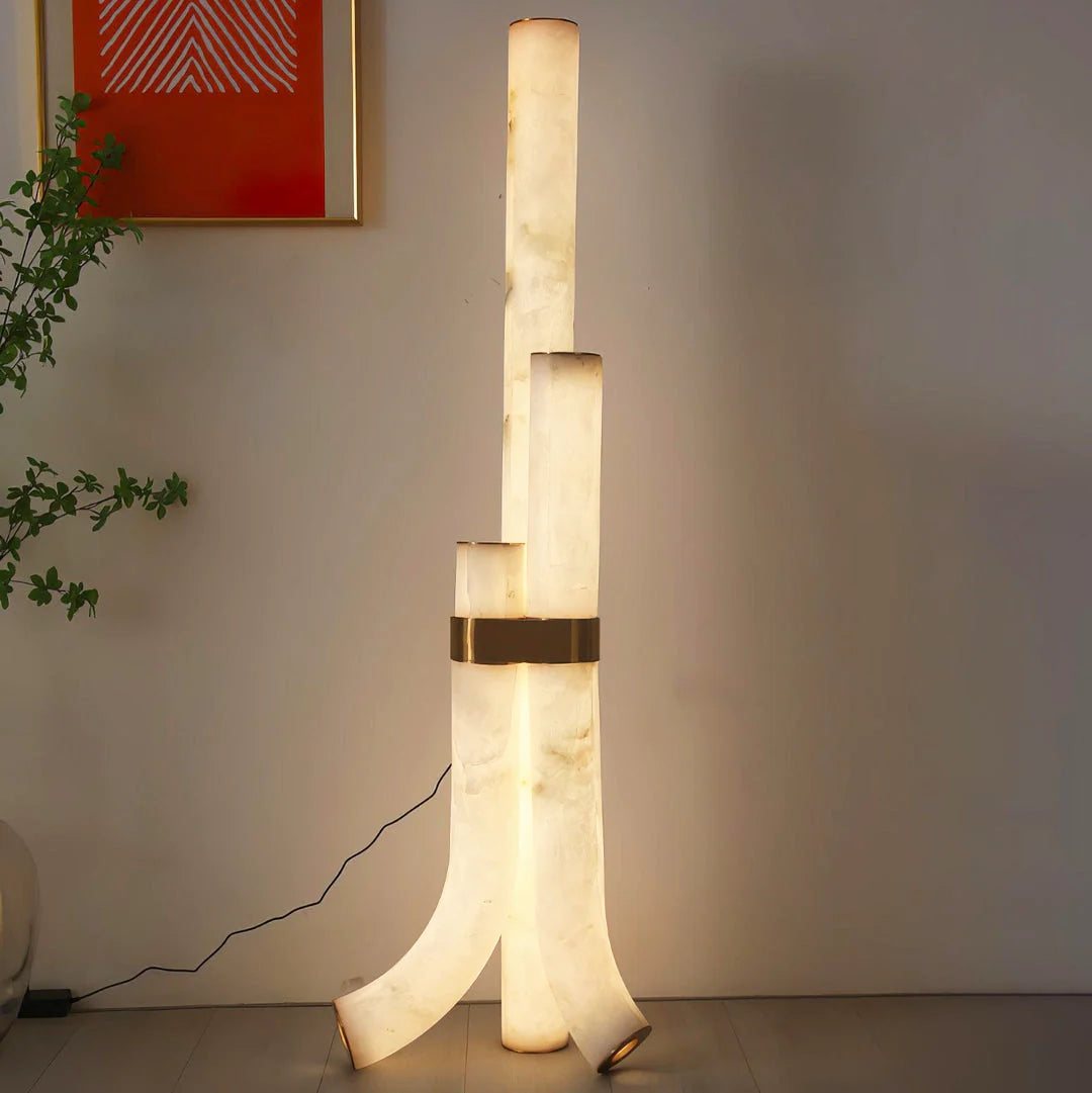 Modern alabaster piped floor lamp by korewolamp featuring a sleek, contemporary design with a tall, cylindrical shape.