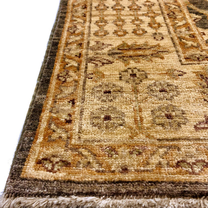 Kirishian Rugs OneKind Chobi-Cypress 4x12 foot runner in green and gold with intricate patterns on woven fabric.