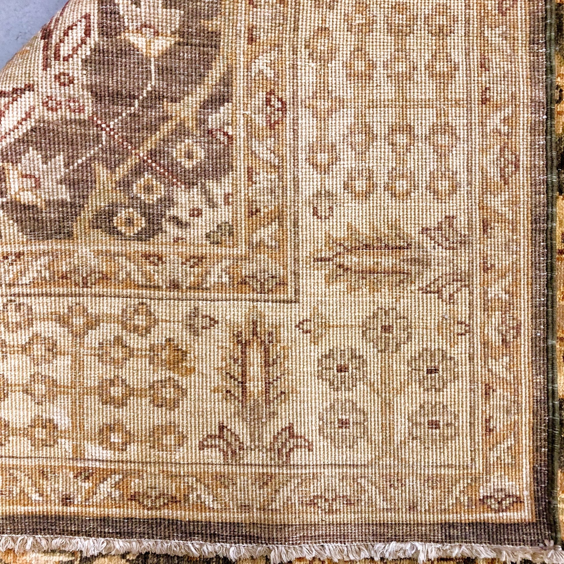 Kirishian Rugs Chobi-Cypress 4x12 runner with green and gold intricate geometric pattern on woven textile.