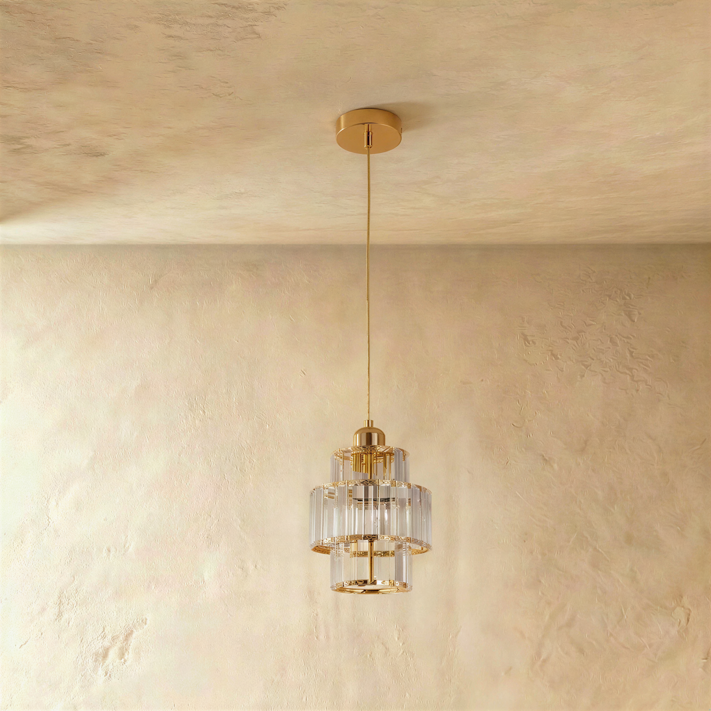Gold Charagh pendant light by Residence Supply with intricate design, hanging from a ceiling fixture.