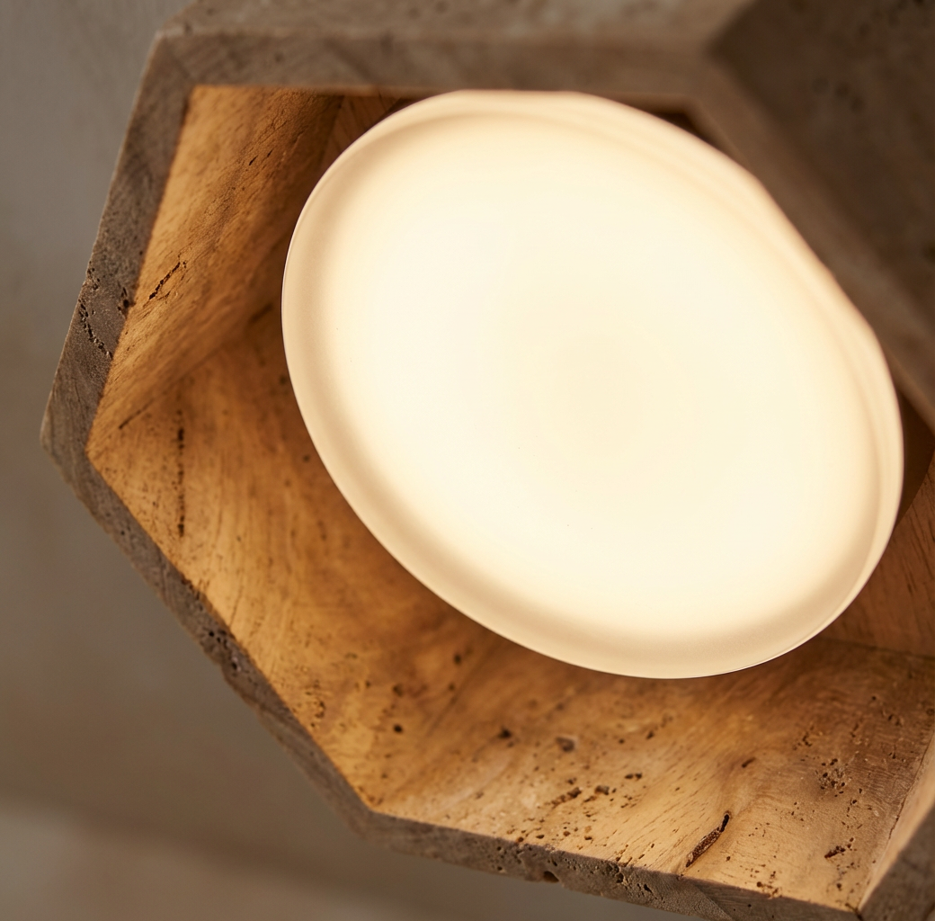 Close-up of Residence Supply Electa ceiling lamp showing sleek design and smooth surface on a plain background.