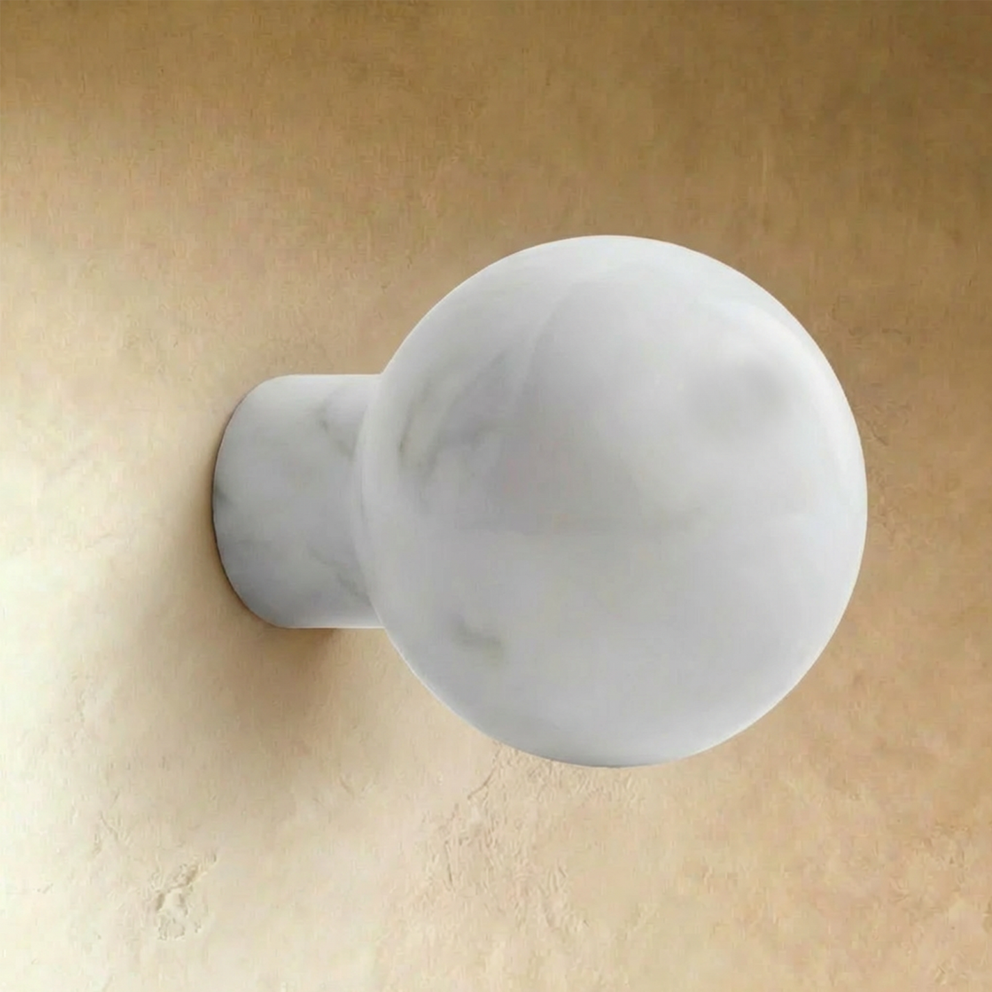 White marble cabinet knob from Residence Supply, featuring a smooth, rounded design for home and garden furniture.