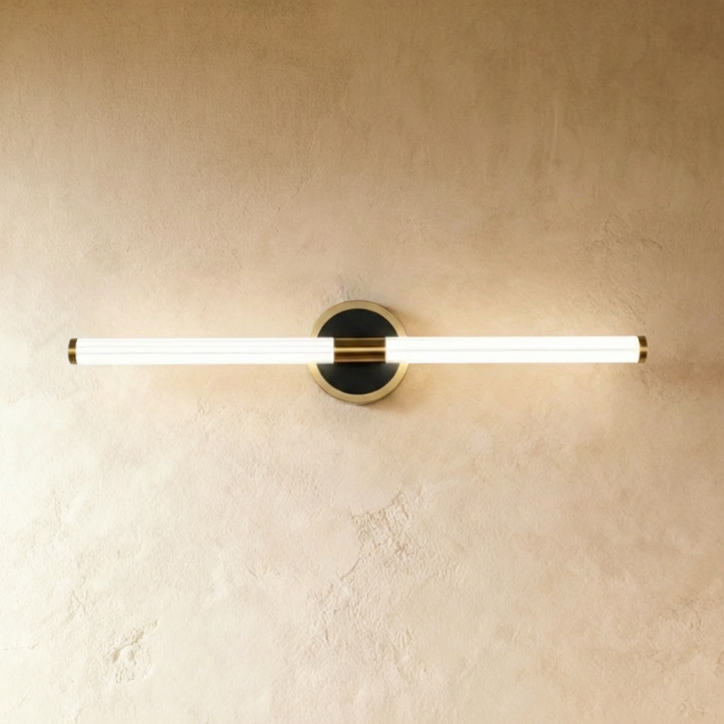 Residence Supply Lacto Wall Lamp mounted on a plain background, showcasing its sleek, modern design and soft lighting.