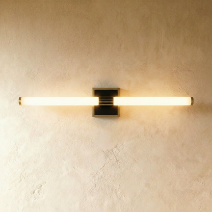 Lacto wall lamp by Residence Supply with sleek design, mounted on plain background, providing modern interior lighting.